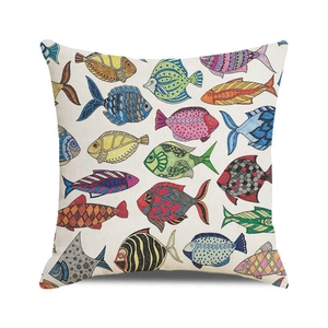 Detail of square cushion cover featuring colorful hand-painted fish on linen fabric texture