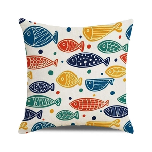 Detail shot of the coarse cotton linen fabric texture and colorful hand-drawn fish pattern
