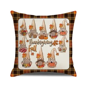 Detailed view of square autumn cushion cover featuring ten gnomes and orange plaid edges