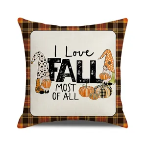 Detail of fall gnome throw pillow cover with Love Fall Most of All text and pumpkin design