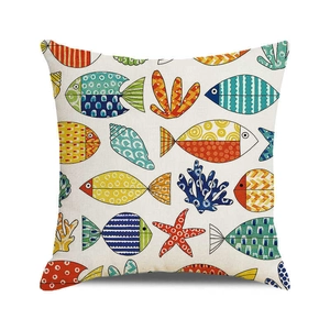 Detailed close-up of cartoon ocean fish print and fabric texture on square cushion cover