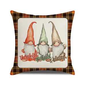 Detail of autumn gnome pillow cover featuring thankful grateful and blessed text
