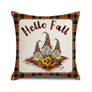 Detailed view of autumn gnome pillow cover featuring Hello Fall text and sunflower motif