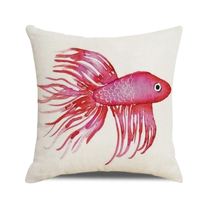 Detailed macro view of the linen texture and watercolor fish print on a decorative pillowcase