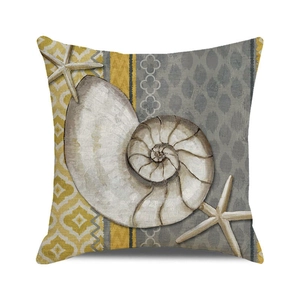 Detail of square linen pillowcase with watercolor seashell and starfish ocean design