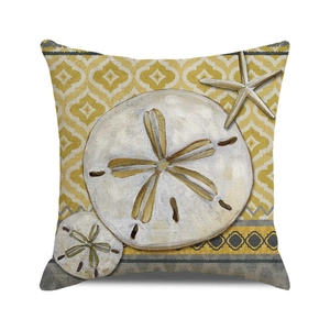 Detail of square cushion cover with watercolor sand dollar and starfish ocean patterns