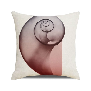 Macro detail of nautical conch shell pattern on square linen blend cushion cover