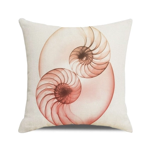 Detail of linen pillowcase featuring artistic warm pink nautilus shell spiral patterns