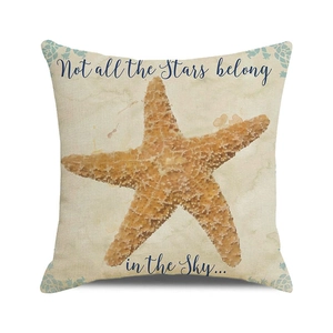 Detailed texture of linen cushion cover with starfish print and quote typography