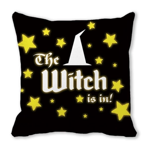 Detail of black Halloween pillowcase with white witch hat and yellow stars pattern