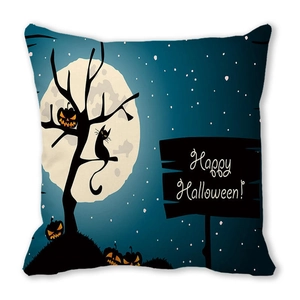 Detail of Halloween pillowcase with black cat, pumpkins, and Happy Halloween text on blue