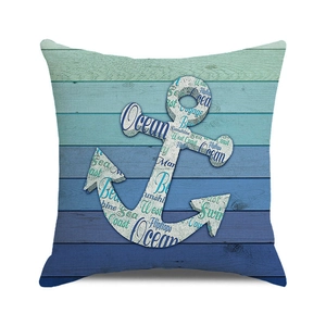 Detail of nautical anchor print with word cloud on blue gradient wooden texture pillowcase