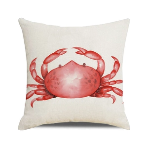 Close-up of a square linen cushion cover featuring a vibrant red watercolor crab print