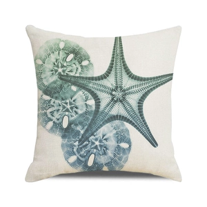Close-up of linen fabric texture on sea star and sand dollar ocean themed pillow cover