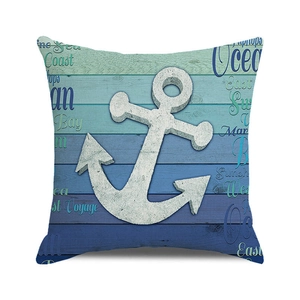 Close-up of anchor printed linen pillow with ocean and east voyage nautical lettering