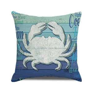 Detail of vintage ocean crab print on canvas pillowcase with nautical text elements