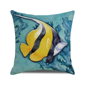 Detail of tropical fish pattern on square linen throw pillow cover with coral texture