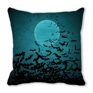 Detail of Halloween pillowcase featuring large full moon and flying bats pattern