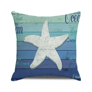 Detail of nautical cushion cover with starfish print and coastal wood grain texture