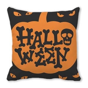 Halloween throw pillow case with orange pumpkin design and skull text on black fabric