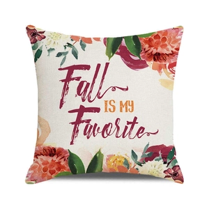Close-up of fall-themed cushion cover with watercolor pumpkins and fall leaves patterns