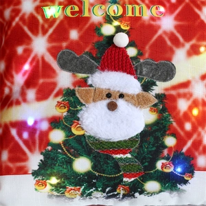 Detail of LED Christmas pillow case featuring 3D reindeer applique and welcome text