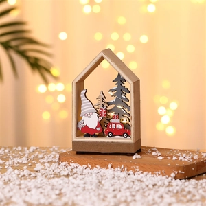 Lighted wooden Christmas house ornament with gnome and red truck in snowy scene