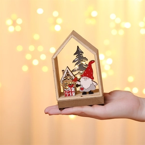 Lighted wooden Christmas gnome cabin decoration with warm LED lights and festive forest scene