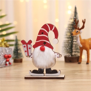 Close-up of a festive wooden Christmas gnome figurine with warm holiday background lighting