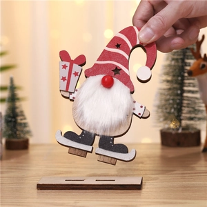 Close-up of a lit wooden Christmas gnome skater with white beard on a natural wood base