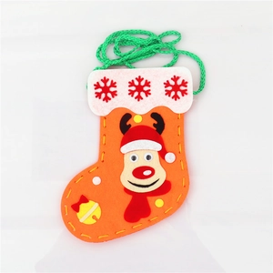 Detail of DIY Christmas stocking craft showing thick felt layers and 3D reindeer design