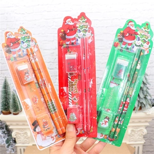 Detailed Christmas stationery set including pencils, ruler, and eraser in festive packaging