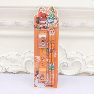 Macro shot of a 5-piece Christmas stationery set with ruler and festive Santa patterns