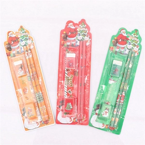 5-piece Christmas stationery set with pencils, ruler, and eraser in festive holiday packaging