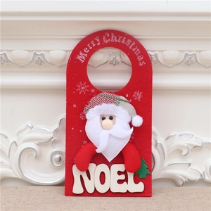 Detail of red felt Santa door hanger with Merry Christmas greeting and Noel text