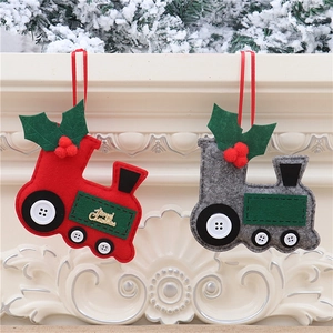 Detail of red and grey felt Christmas car ornaments with Merry Christmas gold embroidery