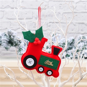 Macro detail of red felt Christmas car ornament with Merry Christmas gold text