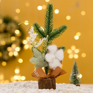 Mini tabletop Christmas tree with red berries, cotton ball, and wooden base decoration