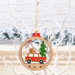 Detail of wooden Christmas tree ornament featuring a red car and star on a white branch