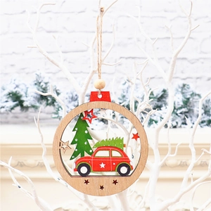 Detail of a painted wooden Christmas ornament featuring a red car and tree with twine