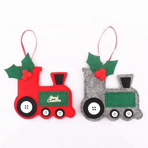 Christmas felt train ornaments in red and grey with Merry Christmas text and buttons