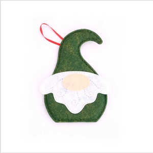 Green faceless Christmas gnome hanging ornament with white beard and red ribbon loop