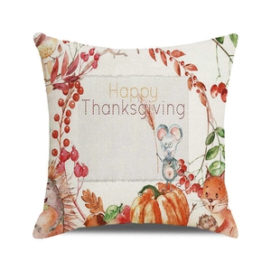 Close-up of watercolor pumpkin and woodland animals on linen Thanksgiving cushion cover