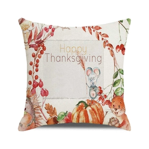 Detail of Happy Thanksgiving pillow cover featuring watercolor pumpkin and leaf patterns