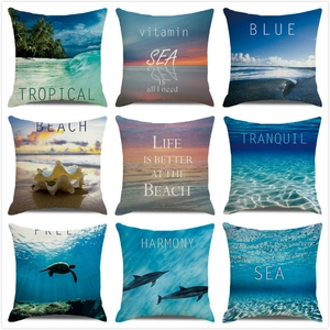 Set of nine ocean-themed decorative pillow covers with beach sunset and marine life designs