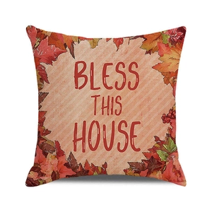Square beige pillow cover with Bless This House text and autumn maple leaves decor