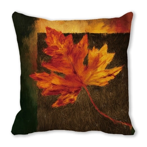 Close-up of fall maple leaf oil painting print on square peach skin cushion cover