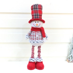Standing Christmas snowman doll in red plaid hat and striped legs for holiday decoration