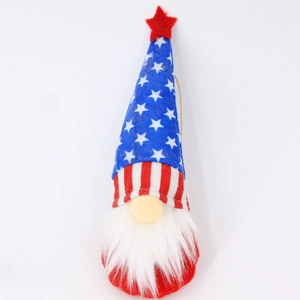 Detail of Independence Day gnome ornament with red and blue star patterns and white beard