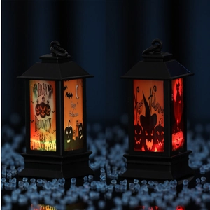 Detail of LED Halloween lanterns with Happy Halloween prints and warm glowing light effects